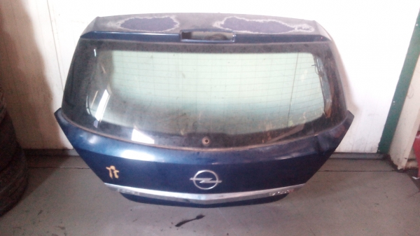Tampa da Mala OPEL ASTRA H | 04 - (20205306).